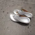 Elegant silver metallic flip-flop sandals featuring chunky high heels for modern women - Silver