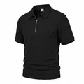 Detailed view of men's black checkerboard jacquard polo shirt with quarter zip. - S / Tops / Black