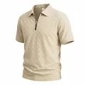 Close-up view showing the textured checkerboard jacquard fabric of a men's khaki polo shirt - S / Tops / Khaki