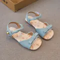 Sweet light blue girl's sandals featuring floral prints and a decorative bow design - Blue