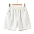 Vista dettagliata di pantaloncini casual in velluto a coste bianco con coulisse elastica - Taglia S / Pantaloni e gonne / Bianco