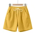 Vista dettagliata dei pantaloncini in velluto a coste gialli con coulisse bianca - Taglia S / Pantaloni e gonne / Giallo