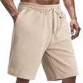 Dettaglio ravvicinato della trama jacquard pesante sui pantaloncini beige da uomo - Taglia S / Pantaloni e gonne / Cachi