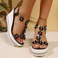 Detailed close-up showing black floral accents and rhinestone platform on wedge sandals - 36 / Stereo Flower Style / Black (2512)