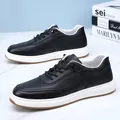 Detailed view of black perforated leather sneakers with white soles for men - 37 / Black Hollow Out Style (Slip On)