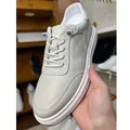 Men's off-white pebble grain leather casual sneaker with convenient no-tie laces - 37 / Lace-Free Single-Lining Style / Beige