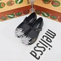 Zapatos jelly Mini Melissa negros con un copo de nieve brillante para niñas pequeñas - Negro