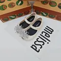Sandalias Melissa de goma crema para niñas con decoración de cristal de copo nieve. - Albaricoque