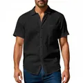 Detailed shot of a casual men's black linen short-sleeve shirt with a pocket and lapel - S / Tops / Black