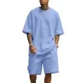 Conjunto deportivo de hombre azul claro de corte holgado con camiseta y pantalones cortos - Azul claro