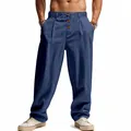 Detailansicht der locker sitzenden blauen Leinenhose für Herren mit Kordelzug und Textur - Marineblau