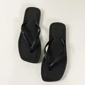 Classic black women's flip-flops featuring a minimalist solid color design for beach outings - 36/37 / Black