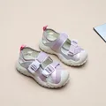 Macro view showing the breathable mesh and adjustable buckles of these kids' sports sandals - 26 / Purple