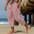 Pantalón de playa casual de algodón y lino rosa para hombre en una playa de arena soleada - Rosa