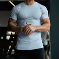 Light blue men's athletic slim-fit stretch t-shirt for fitness and gym workouts - XL / Tops / Light Blue