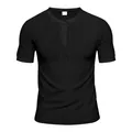 Detail of black men's Henley shirt with textured slub fabric and button placket - Black