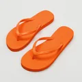 Trendy orange flat flip-flops with anti-slip textured sole for summer beach wear - 35-36 / Orange
