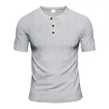 Close-up of textured grey Henley t-shirt for men with three-button placket - Gray