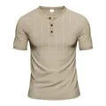 Detailed view of khaki men's Henley shirt with slub grid texture and three-button placket - Khaki