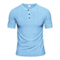 Detail view of light blue men's Henley shirt featuring textured slub fabric - Light Blue