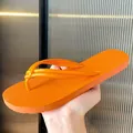 Fashionable bright orange flip-flops with textured sole perfect for beach and summer - 35-36 / Knotted Style / Orange