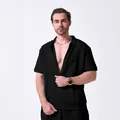 Front view of men's black jacquard zip-up shirt showing texture and collar detail - S / Tops / Black