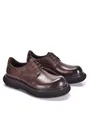 Close-up of brown genuine leather derby shoes with thick platform soles - 38 / Dark Brown