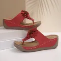 Red wedge flip-flops for women with 3D flower detail and cutout patterns - Red