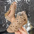 Detail view of stylish beige rhinestone hollow-out Roman sandals with soft wedge sole. - Khaki