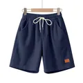 Dettaglio dei pantaloncini di velluto a coste blu navy da uomo con coulisse e logo - Taglia S / Parte Inferiore (CFT-4) / Blu Notte