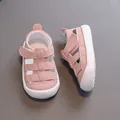Soft sole pink baby sandals with protective closed toe and hollow-out breathable design - Pink