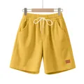 Vista dettagliata degli shorts in velluto a coste giallo senape con coulisse. - Taglia S / Parte Inferiore (CFT-4) / Giallo