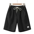 Pantaloncini in velluto a coste neri da uomo con coulisse e vestibilità dritta e rilassata. - Taglia S / Pantaloni e gonne / Nero