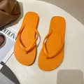 Bright orange non-slip thong sandals for women, perfect for summer beach and outdoor wear. - S (Recommended 36-37) / Orange