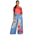 Close-up detail of women's high-waist wide-leg pants with vibrant butterfly prints - S / Bottoms / Blue Butterfly Print