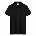 Polo classica da uomo in cotone piqué traspirante a maniche corte in colore nero - Taglia S / Top / Nero