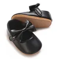Detailed view of black baby princess shoes featuring a large bow and anti-slip soft sole - Black