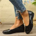 Casual women's black flat shoes featuring a glossy crocodile pattern and shallow mouth. - 36 / Black