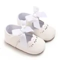 Scarpine bianche da principessa per neonata con grande fiocco e suola piatta morbida - Bianco