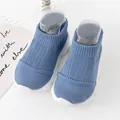 Soft blue knitted baby sock shoes with flexible white non-slip sole for toddlers - Internal Length 11.5cm / Blue