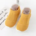 Yellow knit baby sock shoes with flexible white sole for comfortable toddlers walking - Yellow