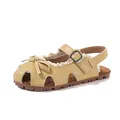 Beigefarbene geschlossene Mädchen-Sandalen mit Schleife und Spitzendetails für den Sommer - Gelb