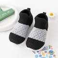 Comfortable black and white knit slip-on baby walking shoes with thick white soles - Black/White
