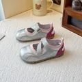Girls' silver ballet-style athletic sandals with pink mesh and cross-over Velcro straps. - Silver