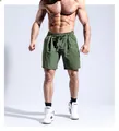 Short en coton homme vert olive coupe ample avec cordon pour un look d'été décontracté - Vert olive