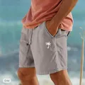 Dettaglio dei pantaloncini da spiaggia grigi in cotone e lino con stampa a palma bianca - Taglia S / Parte Inferiore (Stampa LOGO Bianca) (999999) / Grigio