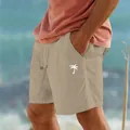 Dettaglio dei pantaloncini da mare in cotone e lino beige con stampa di palma e coulisse - Taglia S / Parte Inferiore (Stampa LOGO Bianca) (999999) / Kaki