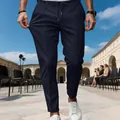 Detailed view of navy blue slim fit business casual trousers with drawstring waist. - S / Bottoms / Navy Blue