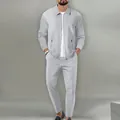 Détail du survêtement homme en maille gaufrée grise avec veste zippée et pantalon ajusté - S / Haut Et Bas / Gris