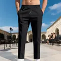Close-up of men's slim fit business casual trousers in black with drawstring waist - Black